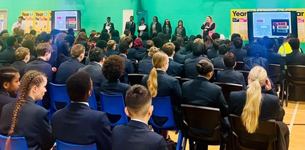 Year 10 students leaders delivering an assembly on significant figures in black history